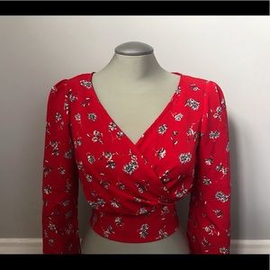 Red floral blouse
